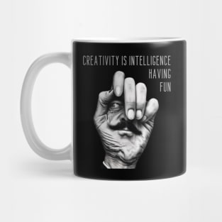 Creativity is intelligence having fun. Mug